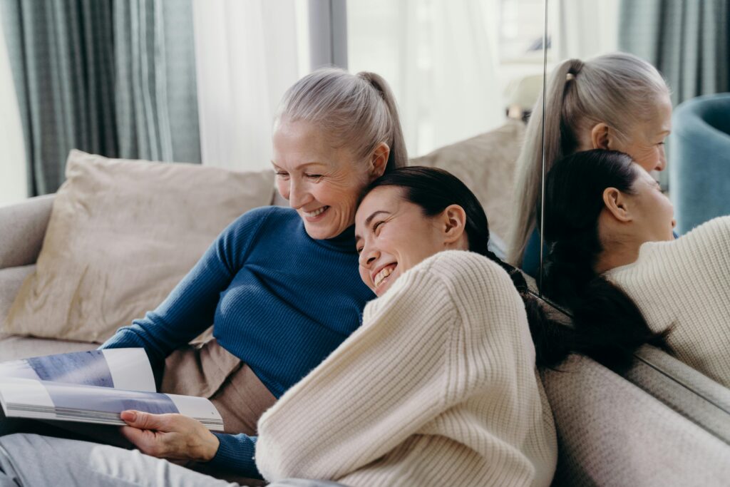 Image of a mother and daughter cuddling for the blog Planned Procrastination: Why Waiting Can Be Part of Your Family Business Succession Plan