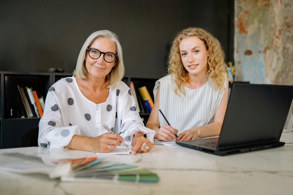 Image of a woman business owner and her successor for the blog, Your Reputation Is Your Most Valuable Asset in Business Succession Planning