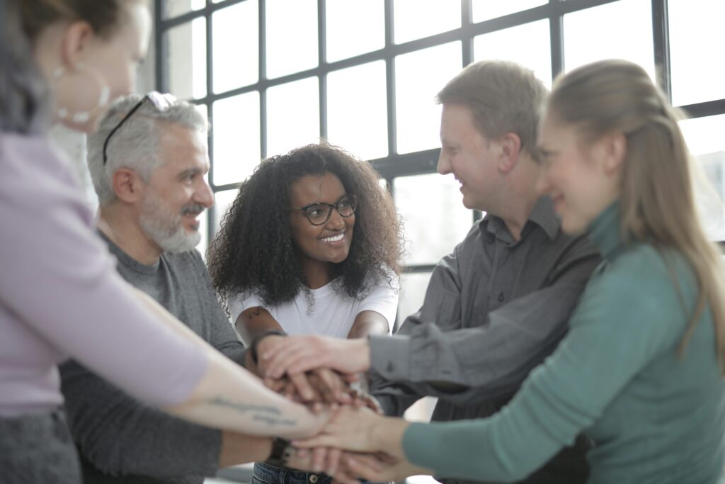 Image of a group of office workers for the blog Transition 3.0: Why Doing It With Them Changes Everything