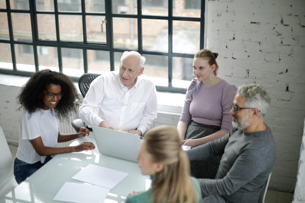 Image of people in a meeting for the blog, Having a Plan on Paper Is Not the Same as Having a Family That's Ready