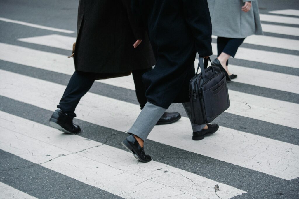 Image of people walking on a pedestrian lane for the blog, You Won't Leave Until You Know Where You're Going