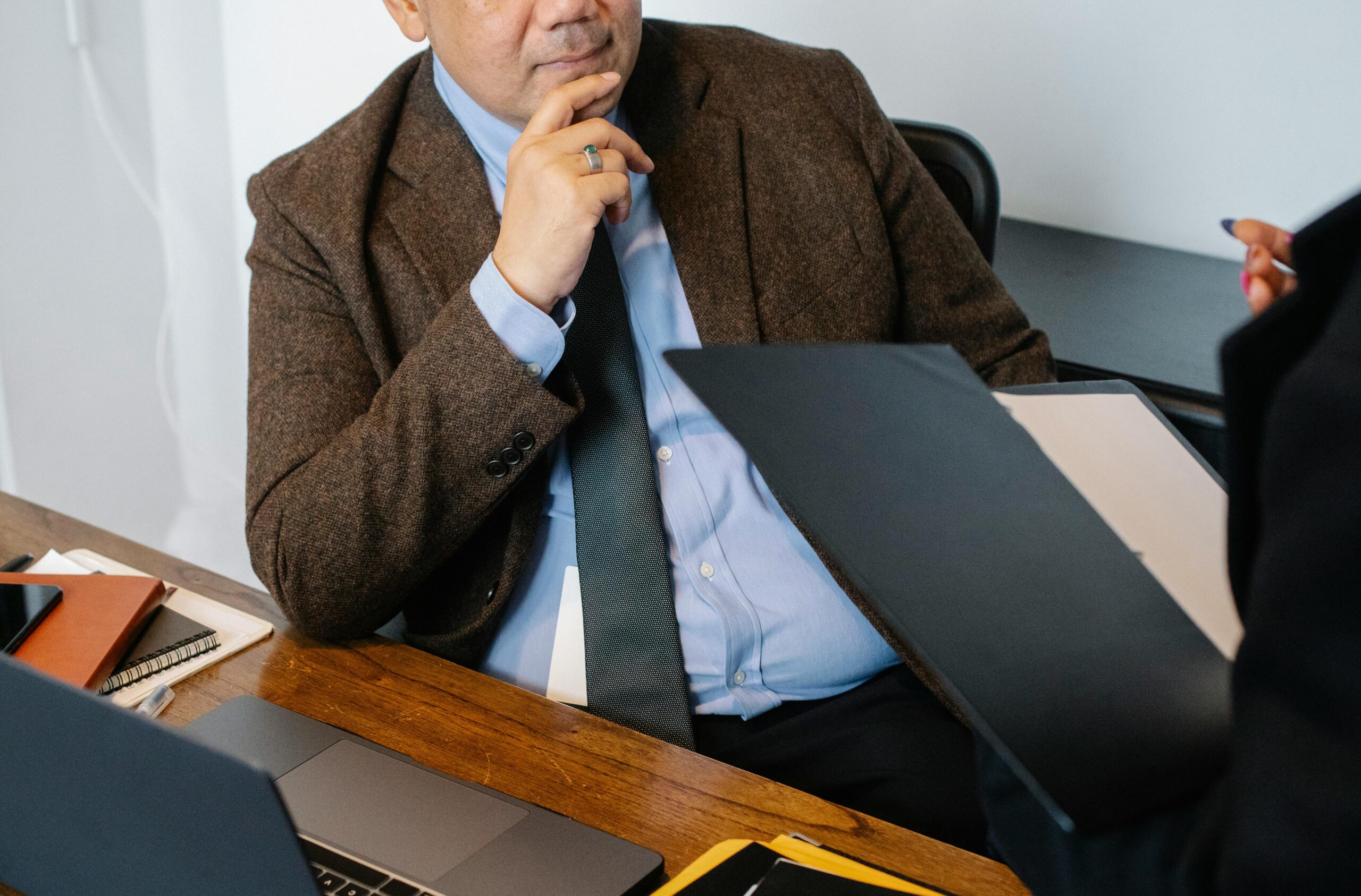 Image of a man in suit for the blog, Why the Most Expensive Mistake in Business Transition Has Nothing to Do with Your Attorney