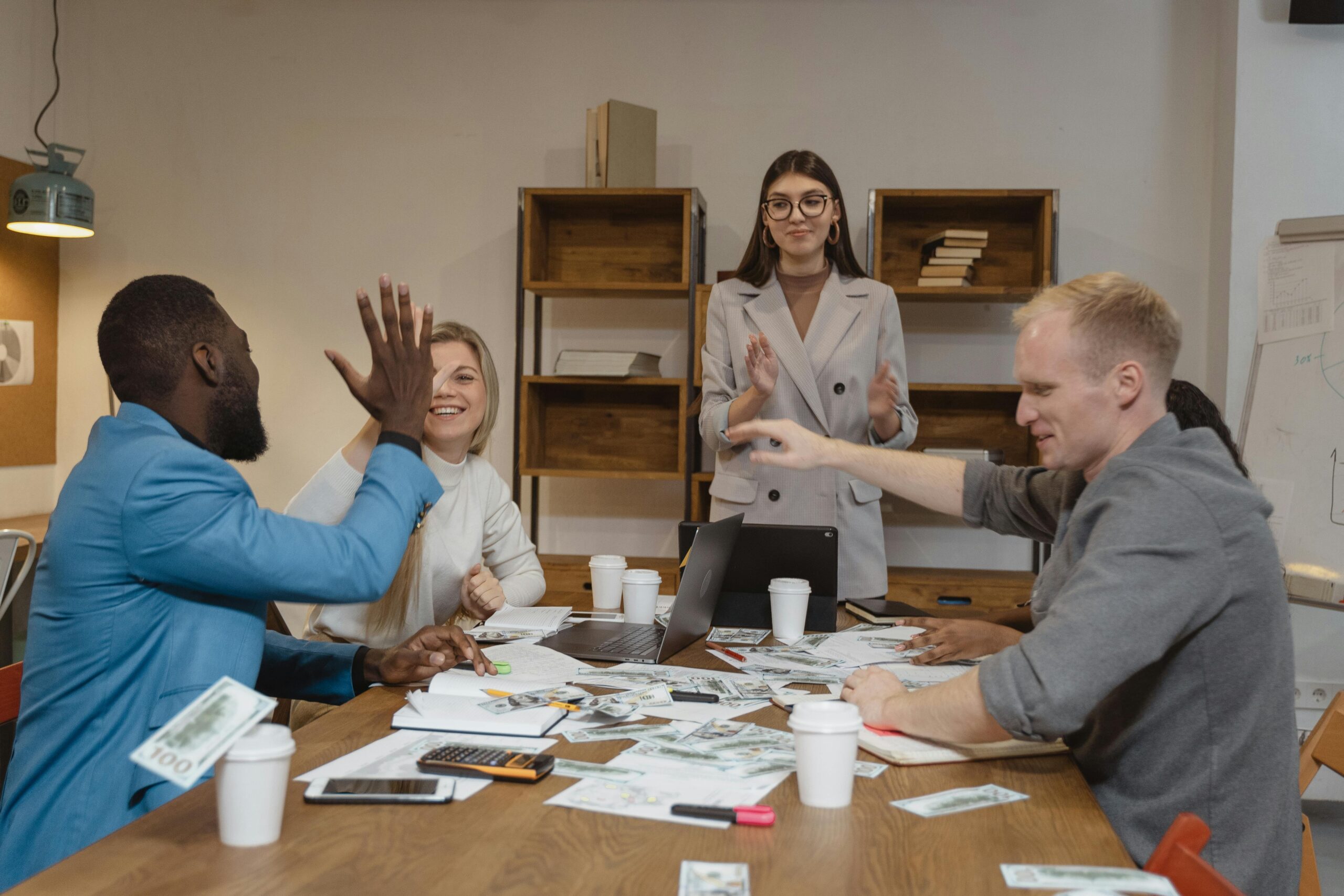 Image of a team meeting for the blog, Your Business Looks Ready to Sell. But Is It Actually Prepared?