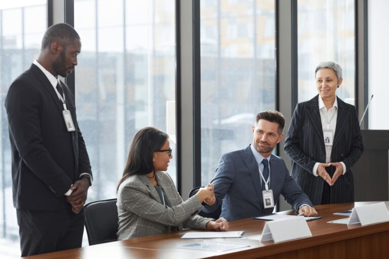 Image of a group of office workers for the blog, Why Business Owners Delay Succession Planning, and the Question That Gets Them Moving